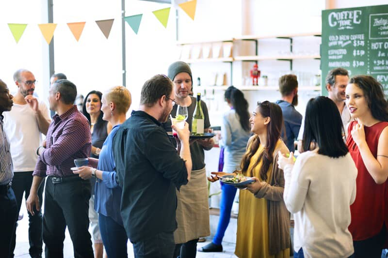 An image of a community event with people gathering.